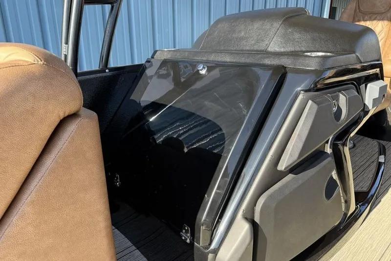 Slide: The Image of Interior of 2026 Premier 330 Escalante boat with leather seating and sleek design. - 31