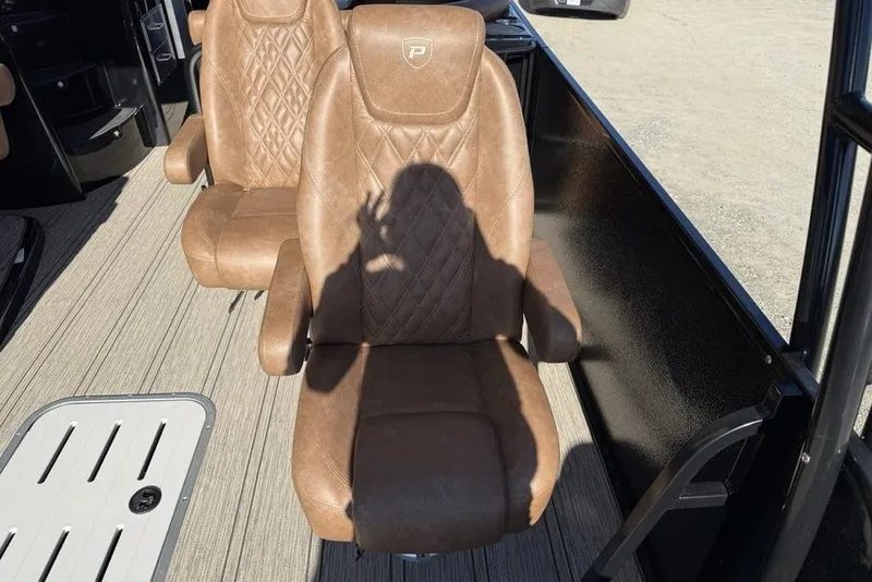 Slide: The Image of Luxurious brown leather seats in 2026 Premier 330 Escalante boat interior. - 34