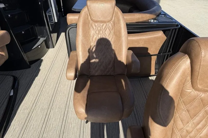 Slide: The Image of Luxurious brown leather seating on 2026 Premier 330 Escalante boat deck. - 36