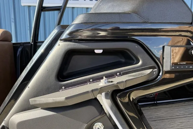 Slide: The Image of Interior detail of 2026 Premier 330 Escalante boat with JL Audio system. - 37