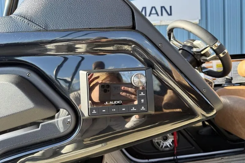 Slide: The Image of Close-up of 2026 Premier 330 Escalante dashboard featuring JL Audio system. - 38