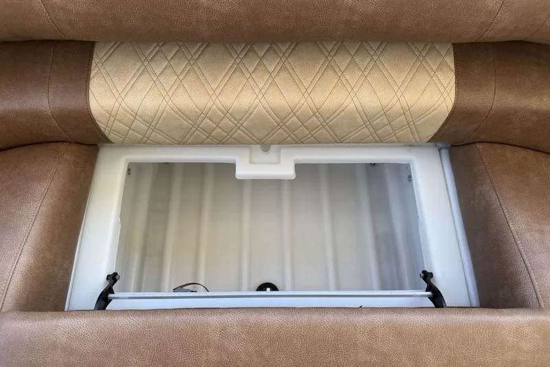 Slide: The Image of Interior storage compartment of 2026 Premier 330 Escalante with leather upholstery. - 51