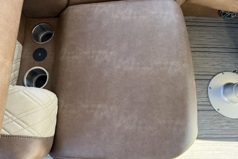 Slide: The Image of Brown leather seating with cup holders in 2026 Premier 330 Escalante. - 57