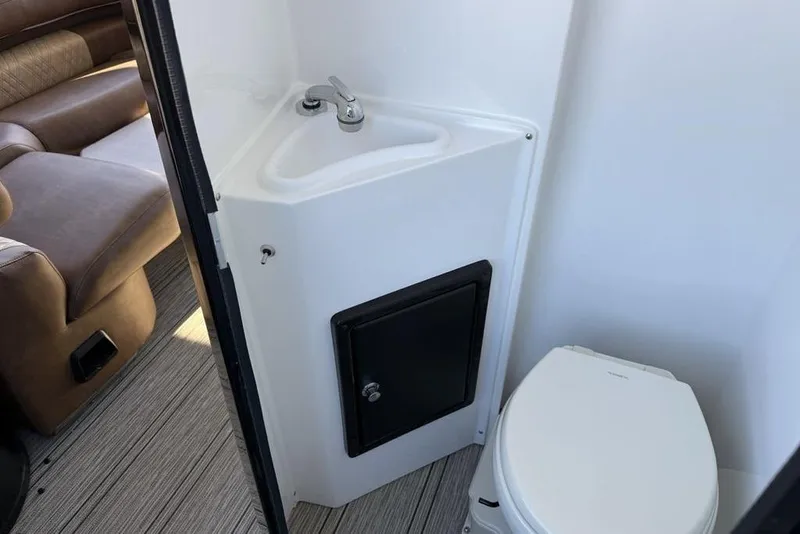 Slide: The Image of Compact bathroom in 2026 Premier 330 Escalante with sink and toilet. - 62