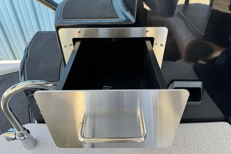 Slide: The Image of Stainless steel drawer and faucet on 2026 Premier 330 Escalante boat. - 63