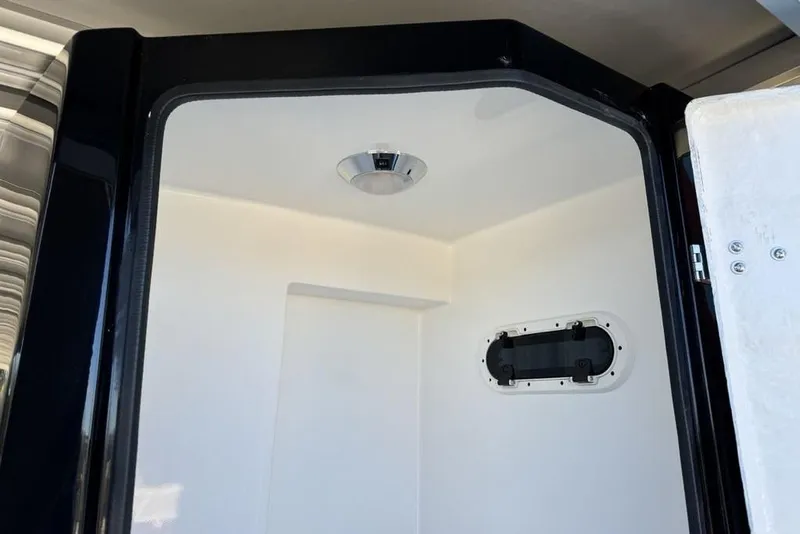 Slide: The Image of Interior of 2026 Premier 330 Escalante RV shower with modern fixtures. - 65