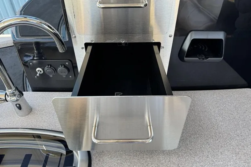 Slide: The Image of Stainless steel drawer and faucet in 2026 Premier 330 Escalante kitchen area. - 67