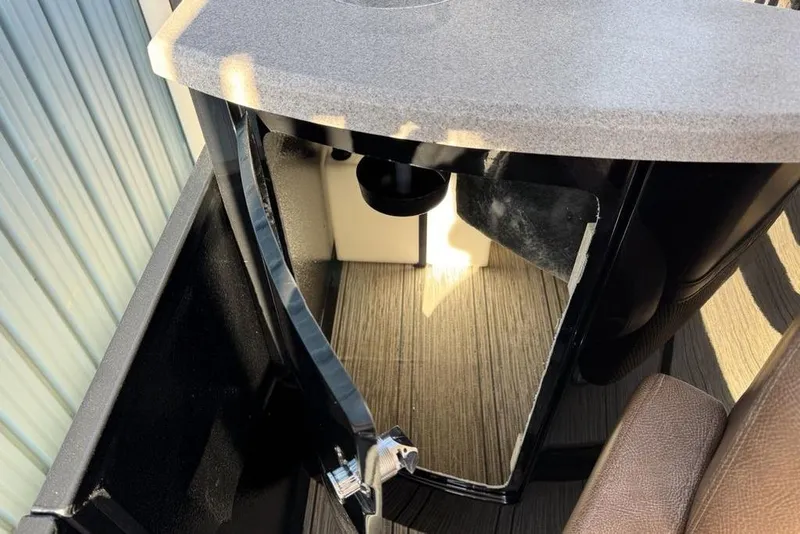 Slide: The Image of Open cabinet in 2026 Premier 330 Escalante, showcasing interior storage space. - 68