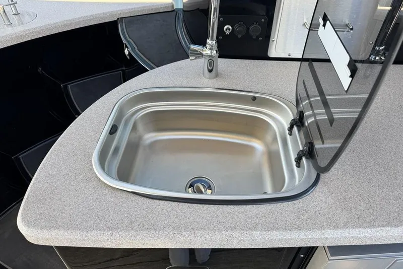 Slide: The Image of Stainless steel sink in 2026 Premier 330 Escalante boat kitchen area. - 71