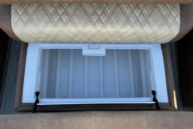 Slide: The Image of 2026 Premier 330 Escalante seat storage with quilted upholstery and integrated cooler. - 76