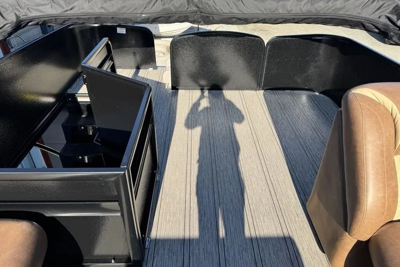Slide: The Image of Interior view of 2026 Premier 330 Escalante boat with seating and flooring. - 82
