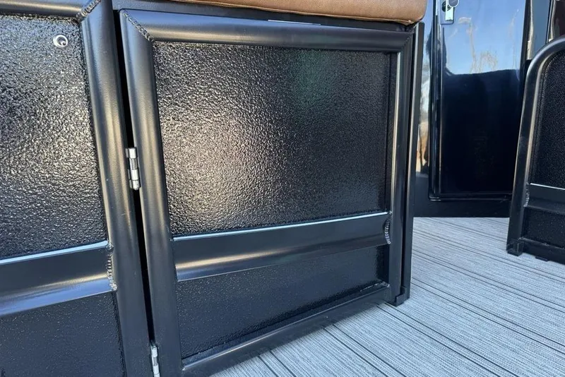 Slide: The Image of Close-up of 2026 Premier 330 Escalante's textured black panel and flooring. - 87