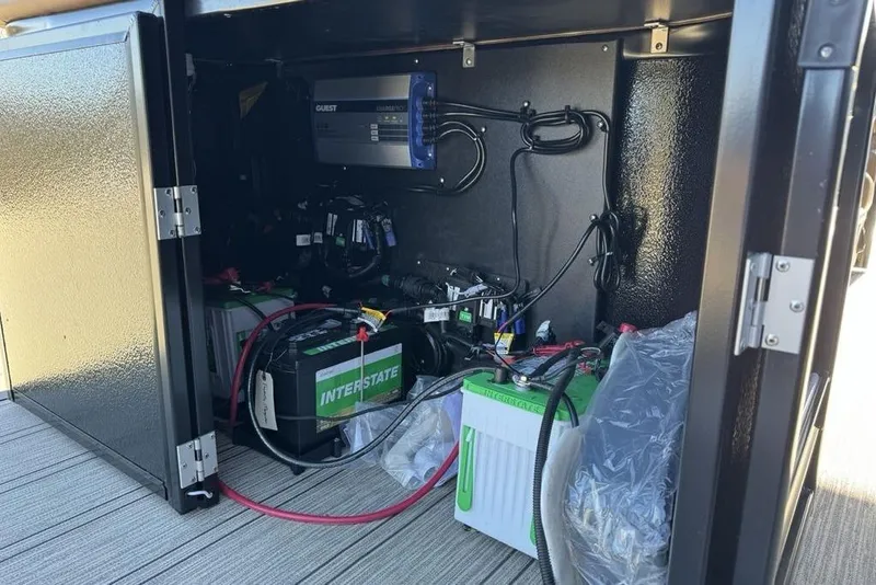 Slide: The Image of Battery compartment of 2026 Premier 330 Escalante with Interstate batteries and wiring. - 88