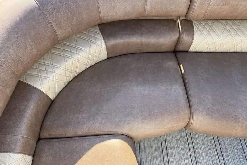 Slide: The Image of Luxurious seating detail of 2026 Premier 330 Escalante with elegant stitching and texture. - 9