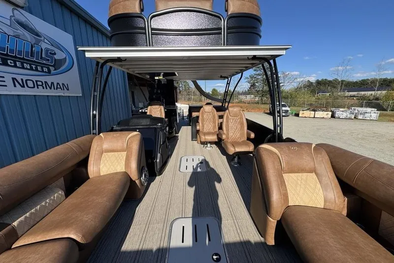 Slide: The Image of 2026 Premier 330 Escalante pontoon boat with luxurious seating and modern design. - 90