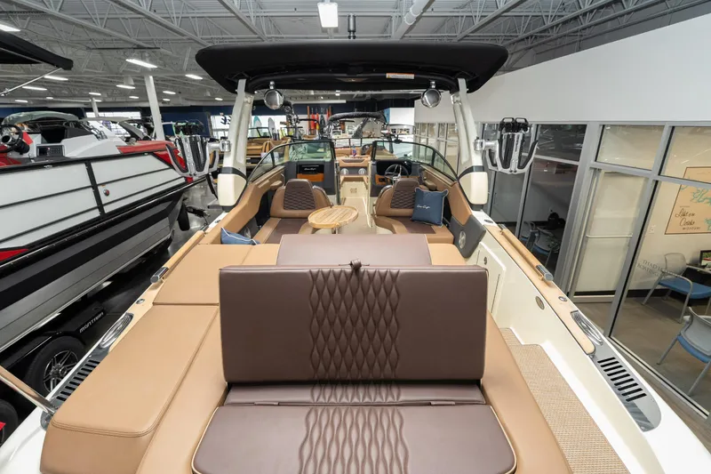 Slide: The Image of 2026 Chris-Craft Sportster 28 luxury boat interior with plush seating and modern design. - 13
