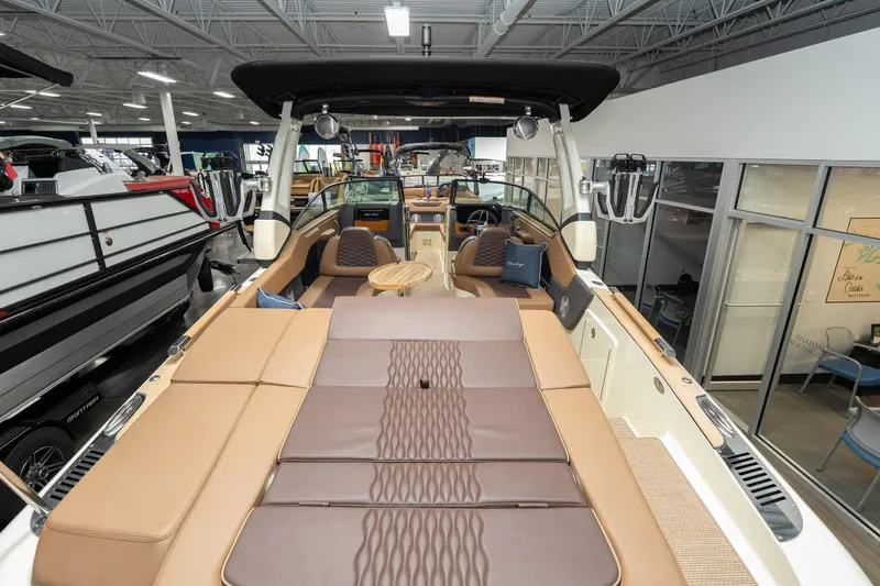 Slide: The Image of 2026 Chris-Craft Sportster 28 luxury boat interior with plush seating and modern design. - 14