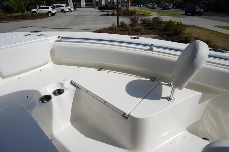 Slide: The Image of 2024 Key West 219 FS boat interior with seating and cup holders. - 25