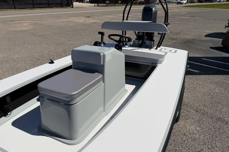 Slide: The Image of 2026 Chittum Skiffs 18 Laguna Madre boat with sleek design and modern console. - 11