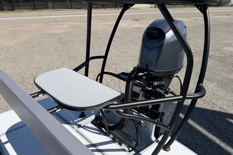 Slide: The Image of 2026 Chittum Skiffs 18 Laguna Madre boat engine and seating detail. - 15