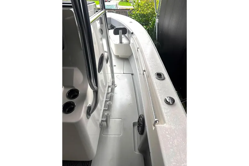 Slide: The Image of 2019 Contender 30 ST boat interior with rod holders and sleek design. - 10