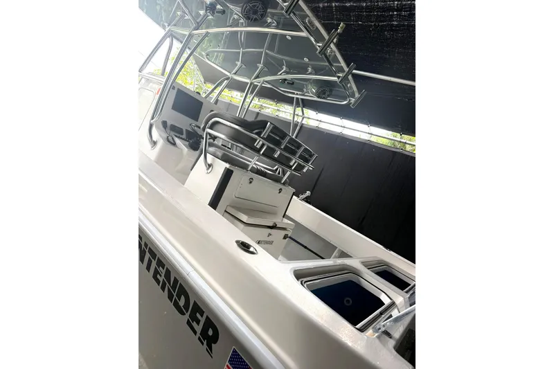 Slide: The Image of 2019 Contender 30 ST boat interior with helm and seating area. - 3