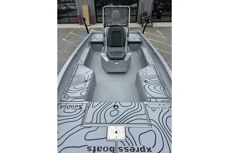 Slide: The Image of 2025 Xpress H22B Bay boat interior with sleek design and modern seating. - 12