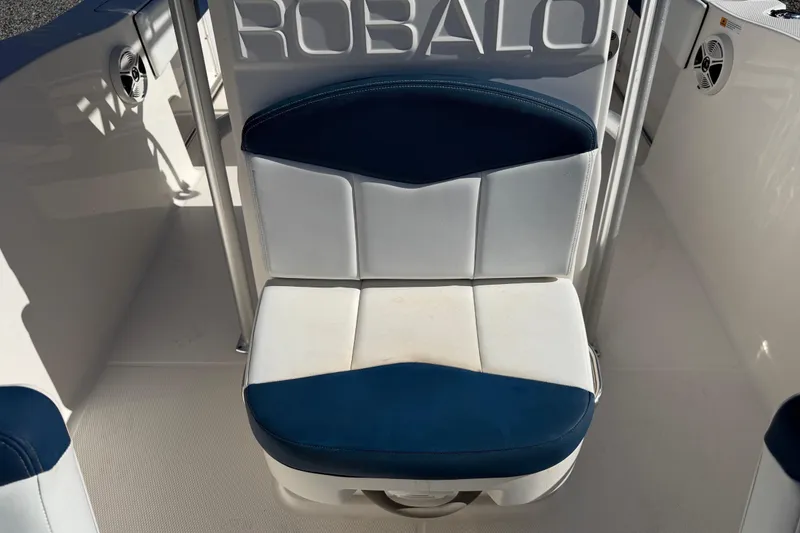 Slide: The Image of 2019 Robalo R200 Center Console boat seat with blue and white upholstery. - 6