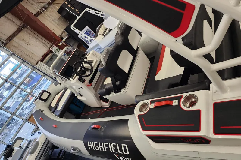 Slide: The Image of 2026 Highfield Velox 560 boat interior with modern design and advanced controls. - 13