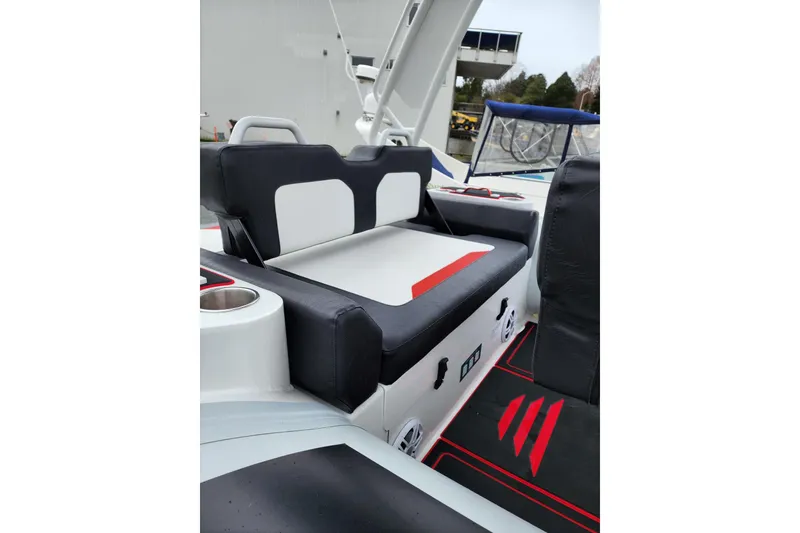Slide: The Image of 2026 Highfield Velox 560 boat interior with sleek seating and modern design elements. - 5