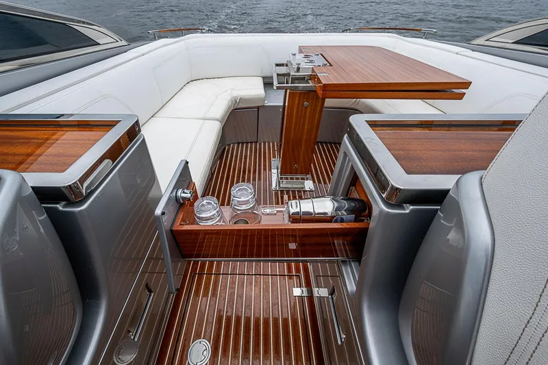 Slide: The Image of Luxurious interior of 2020 Riva 38' Rivamare yacht with elegant wood and leather seating. - 10