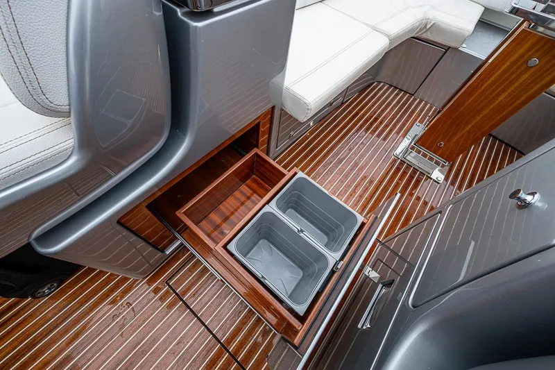 Slide: The Image of Luxurious interior of 2020 Riva 38' Rivamare yacht with wooden flooring and seating. - 11