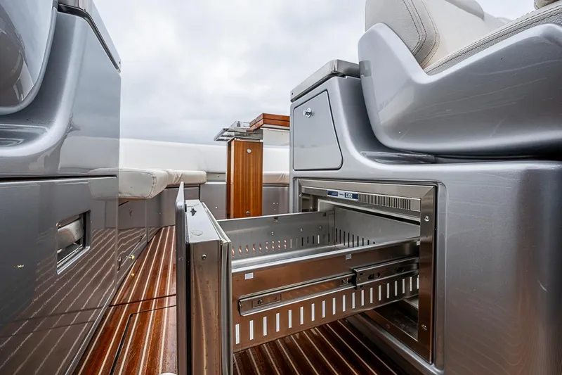 Slide: The Image of Interior of 2020 Riva 38' Rivamare yacht with open stainless steel drawer. - 12
