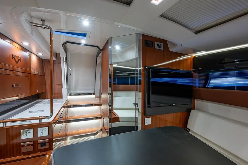 Slide: The Image of Luxurious interior of 2020 Riva 38' Rivamare yacht with modern amenities and sleek design. - 18