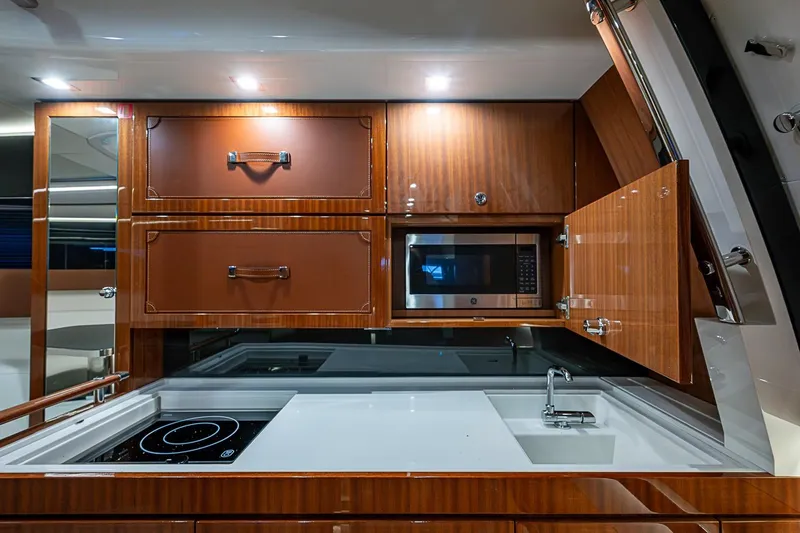 Slide: The Image of Luxurious kitchen interior of 2020 Riva 38' Rivamare yacht with modern appliances. - 19
