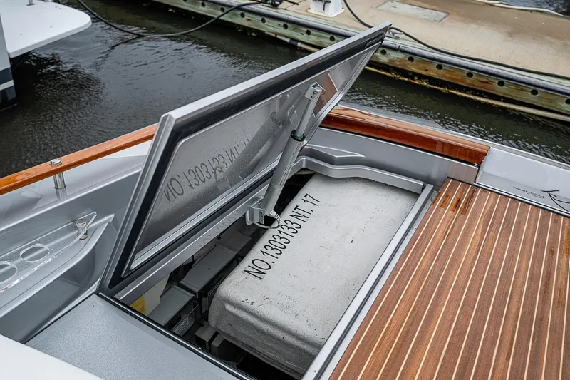 Slide: The Image of Open storage compartment on a 2020 Riva 38' Rivamare yacht, dockside view. - 27