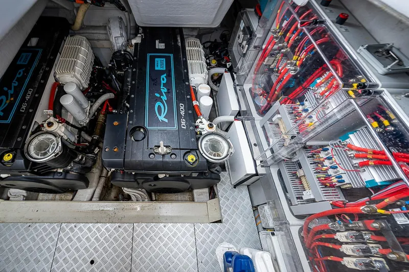 Slide: The Image of Engine room of 2020 Riva 38' Rivamare with visible wiring and components. - 29