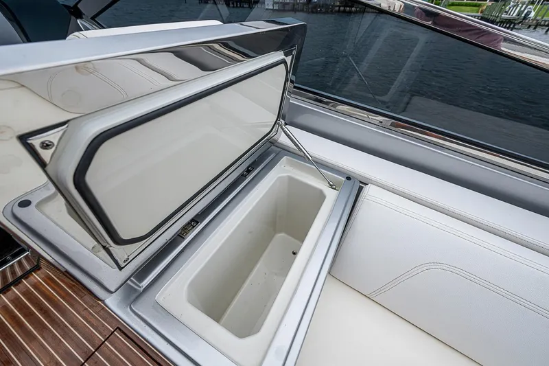 Slide: The Image of Open storage compartment on 2020 Riva 38' Rivamare yacht, featuring sleek design and luxury finish. - 9
