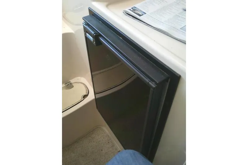 Slide: The Image of Compact refrigerator inside 2004 Grady White 27 Islander boat cabin. - 47