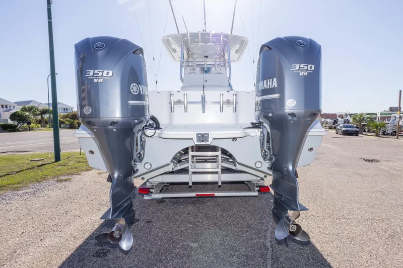 Slide: The Image of 2014 Freeman 33 boat with dual Yamaha 350 V8 outboard engines. - 20