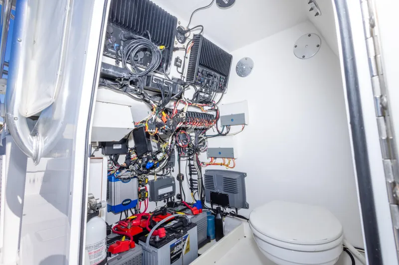 Slide: The Image of Electrical system and equipment inside a 2014 Freeman 33 boat cabin. - 43