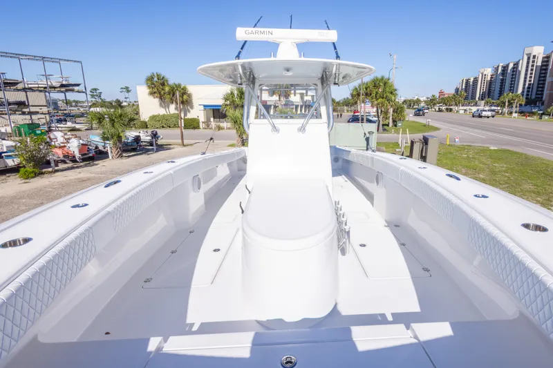 Slide: The Image of 2014 Freeman 33 boat with spacious deck and modern Garmin equipment. - 46