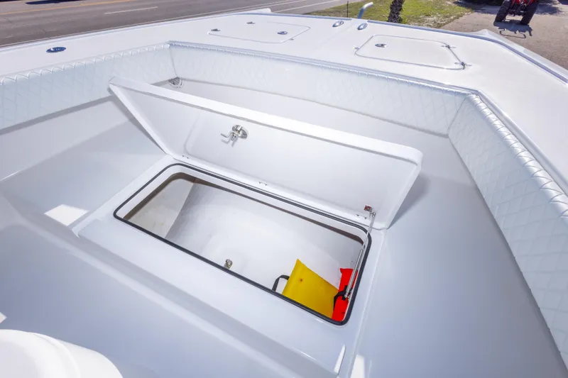 Slide: The Image of Open storage compartment on a 2014 Freeman 33 boat deck. - 52