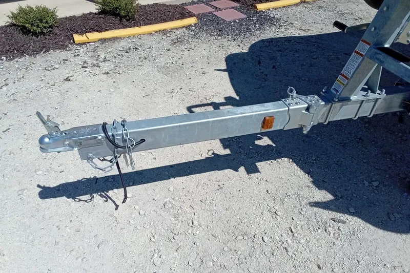 Slide: The Image of Trailer hitch of 2023 Godfrey Sweetwater 2086 CX on gravel surface. - 4