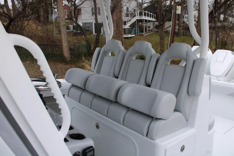 Slide: The Image of 2026 Yellowfin 39 Offshore boat with luxurious gray seating and modern design. - 16