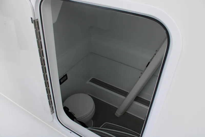 Slide: The Image of Interior view of 2026 Yellowfin 39 Offshore boat's compact bathroom space. - 17