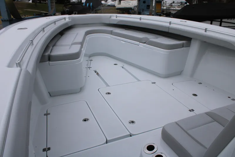 Slide: The Image of 2026 Yellowfin 39 Offshore boat interior with spacious seating and storage compartments. - 18