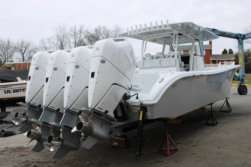 Slide: The Image of 2026 Yellowfin 39 Offshore boat with four powerful outboard engines on display. - 2