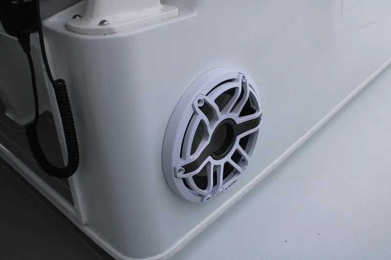 Slide: The Image of Speaker on 2026 Yellowfin 39 Offshore boat, featuring sleek white design. - 25