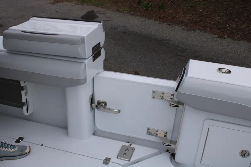 Slide: The Image of 2026 Yellowfin 39 Offshore boat interior with seating and storage compartments. - 26